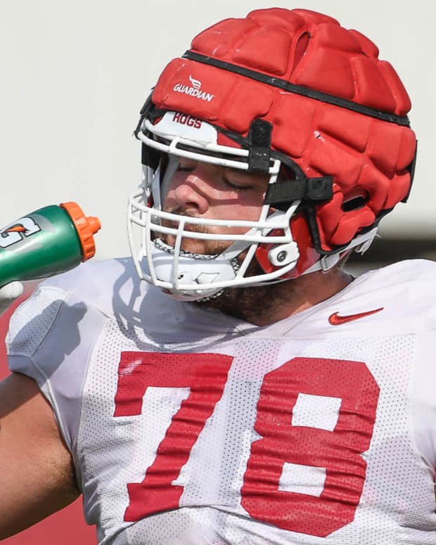 Razorbacks' offensive lineman Joshua Braun at practice outside Tuesday
